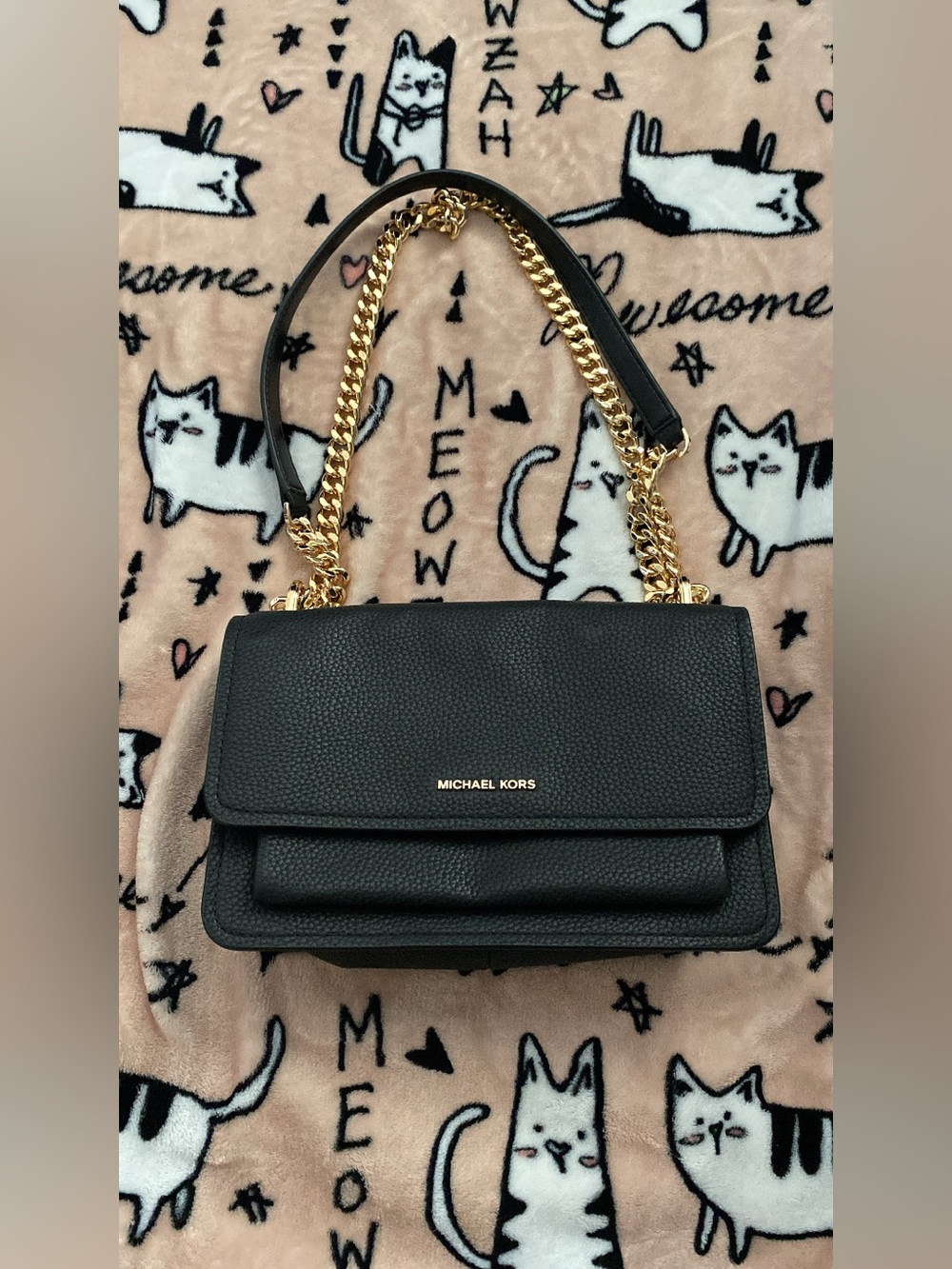 Michael Kors black shoulder and crossbody with gold hardware.
